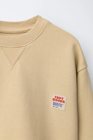 Толстовка из крашеной ткани с нашивкой- Заказать в России