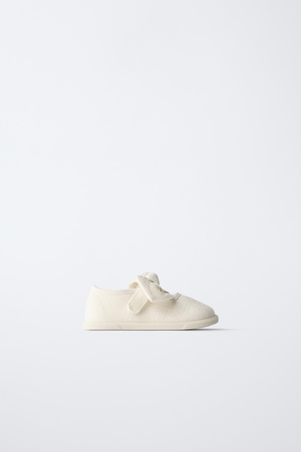 Кеды без каблука с бантом