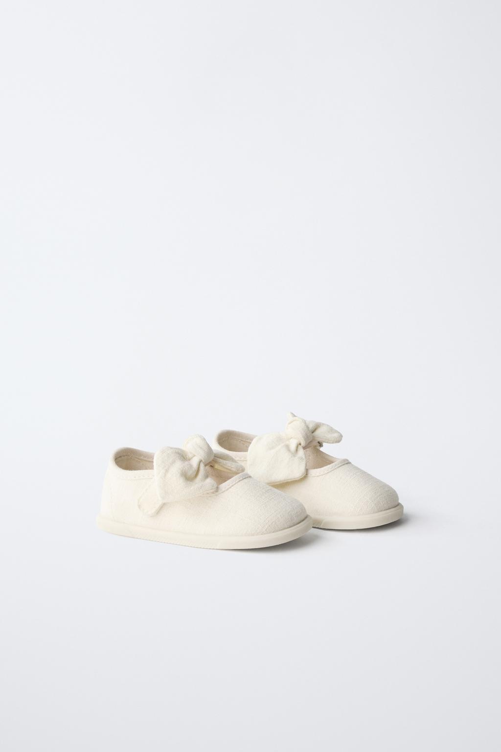 Кеды без каблука с бантом