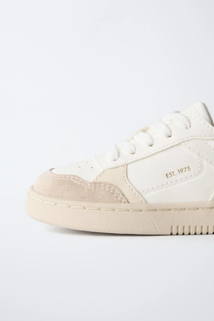 Кроссовки с контрастными деталями- Заказать в России