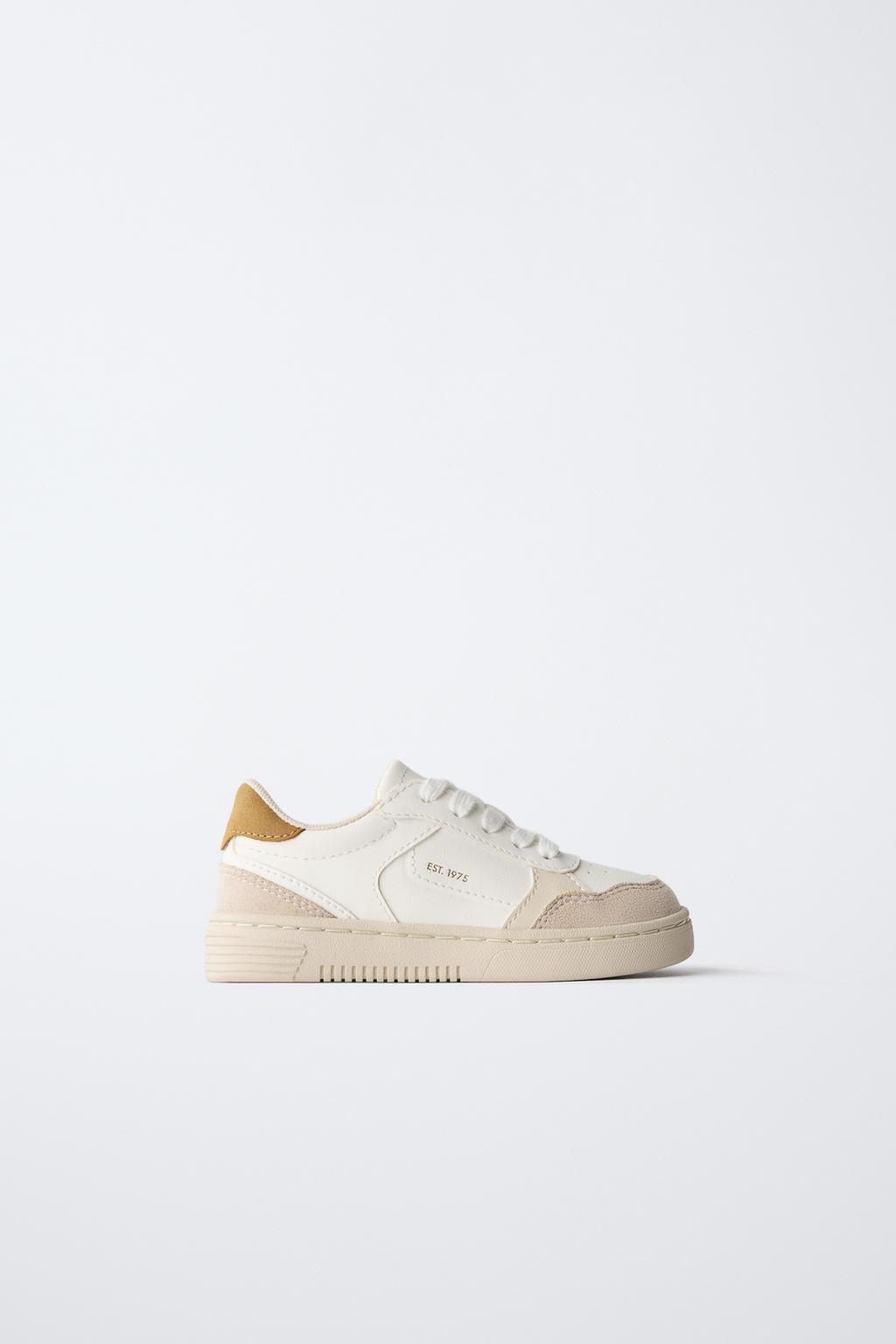 Кроссовки с контрастными деталями