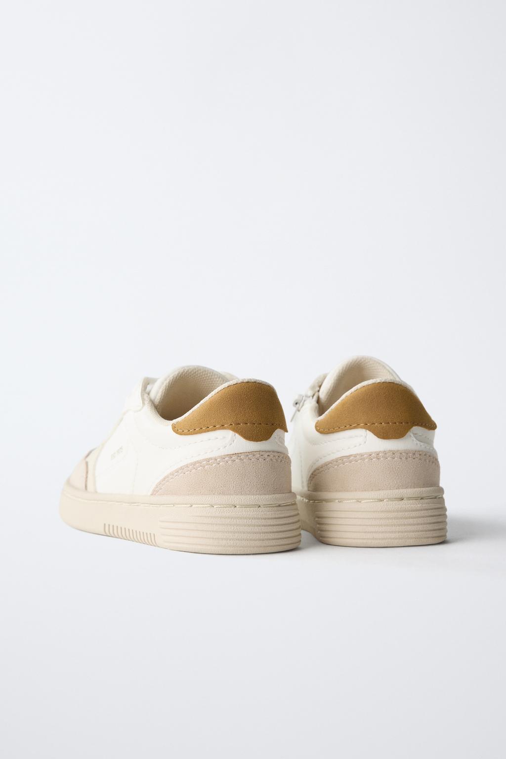 Кроссовки с контрастными деталями