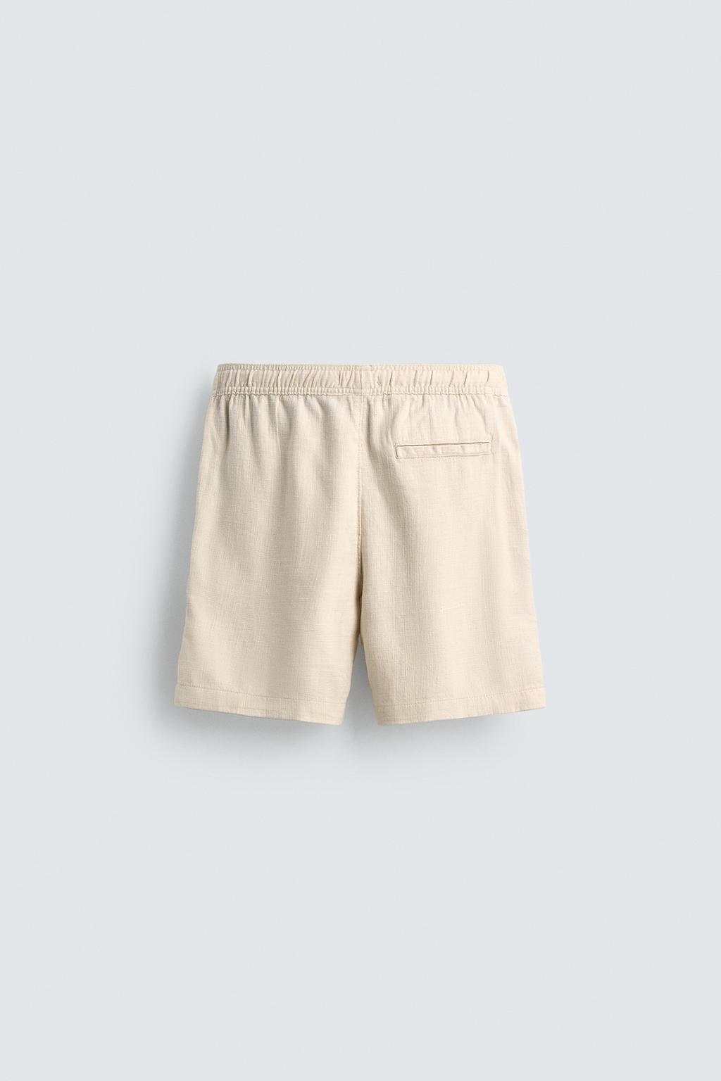 ШОРТЫ КЛАССИЧЕСКОГО КРОЯ ИЗ РЕЛЬЕФНОЙ ТКАНИ