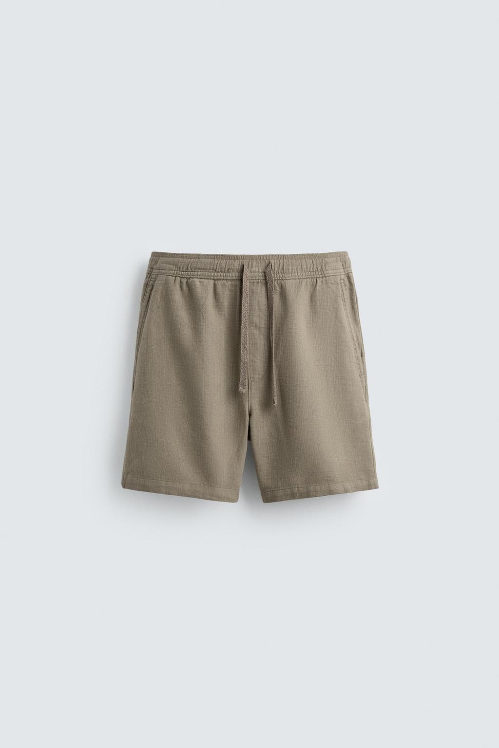 ШОРТЫ КЛАССИЧЕСКОГО КРОЯ ИЗ РЕЛЬЕФНОЙ ТКАНИ