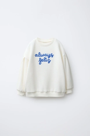 Свитер вафельный с вышитой надписью- Заказать в России