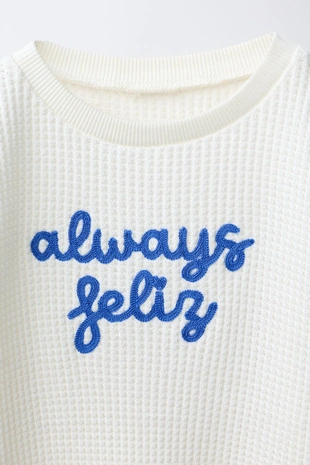 Свитер вафельный с вышитой надписью- Заказать в России