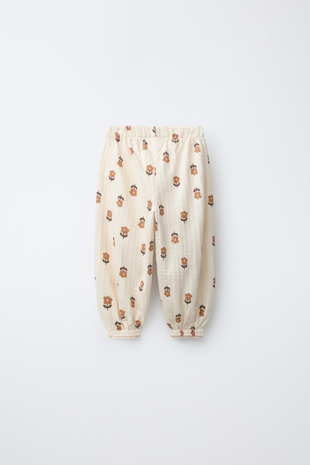 БРЮКИ-ДЖОГГЕРЫ С ЦВЕТОЧНЫМ КРУЖЕВОМ