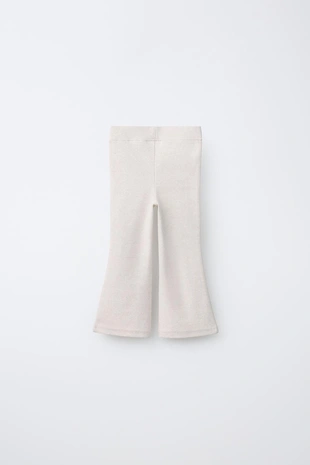 Легинсы клёш из интерлока с этикеткой- Заказать в России