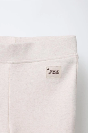 Легинсы клёш из интерлока с этикеткой- Заказать в России