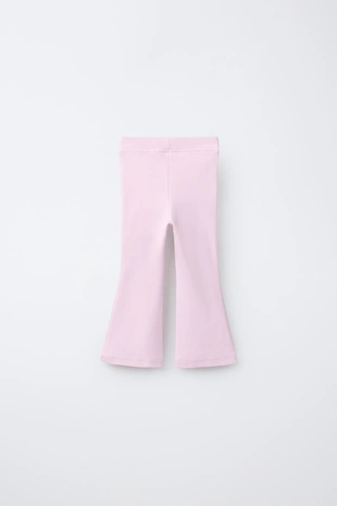 Легинсы клёш из ткани интерлок с этикеткой- Заказать в России