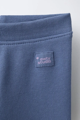 Леггинсы в рубчик с этикеткой- Заказать в России