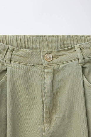 Брюки баллон с защипами- Заказать в России