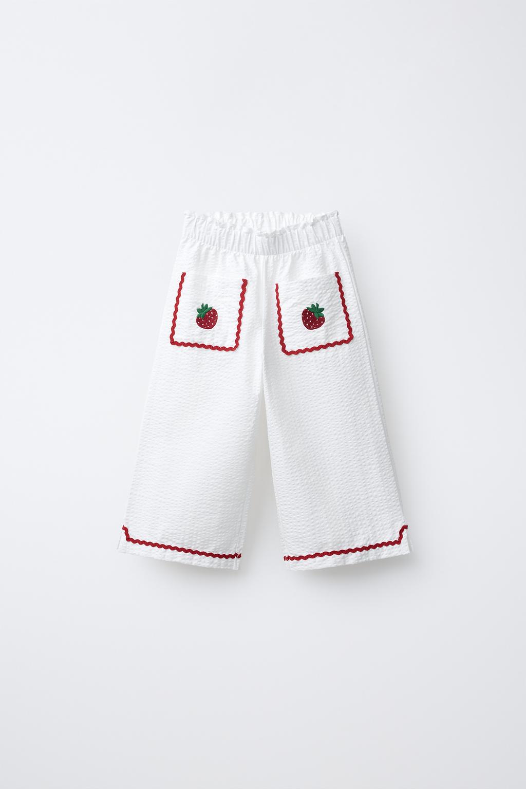 БРЮКИ-КЮЛОТЫ ИЗ РЕЛЬЕФНОЙ ТКАНИ С КОНТРАСТНЫМИ ВОЛНИСТЫМИ КРАЯМИ