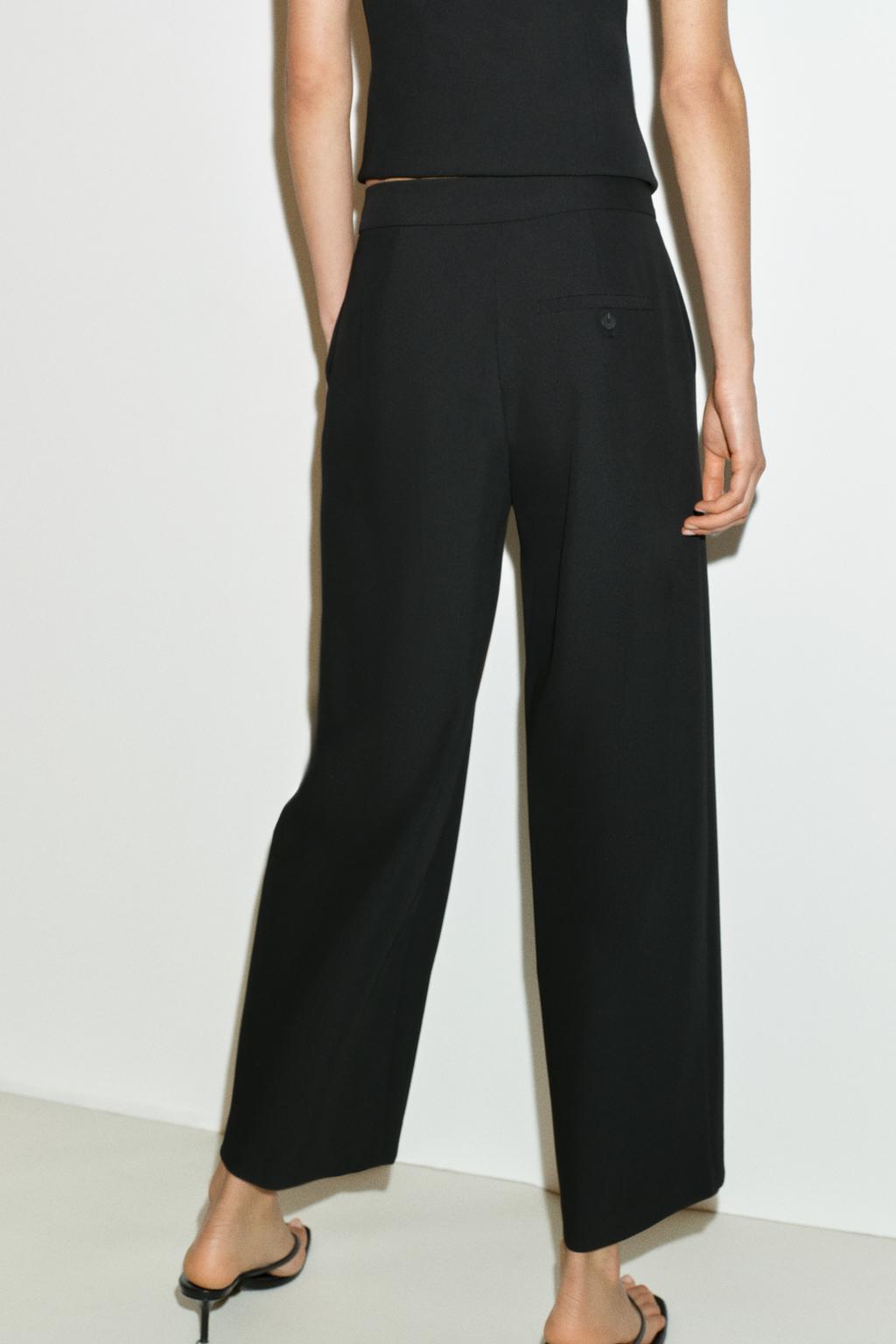 БРЮКИ  С ЗАЩИПАМИ