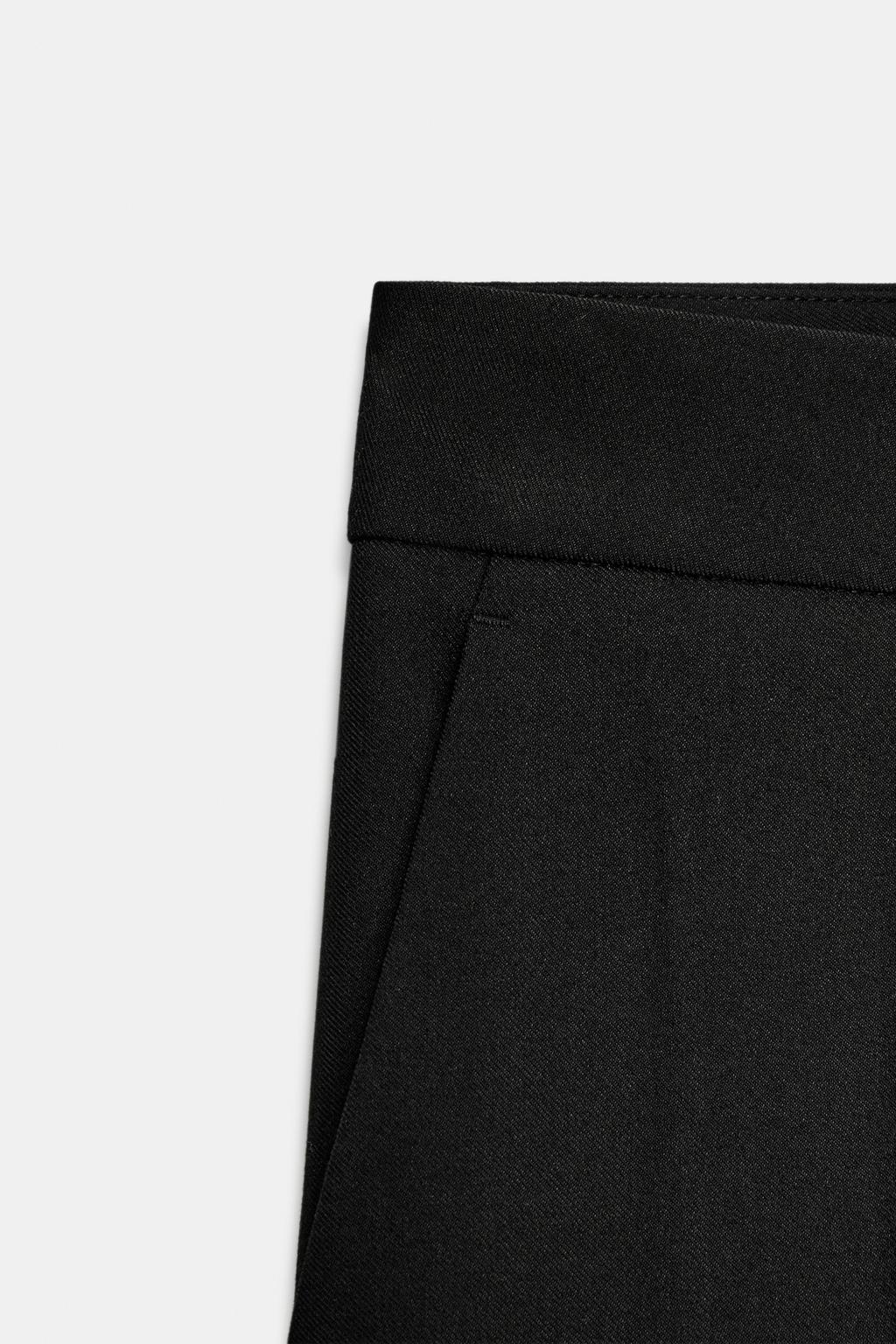 БРЮКИ  С ЗАЩИПАМИ