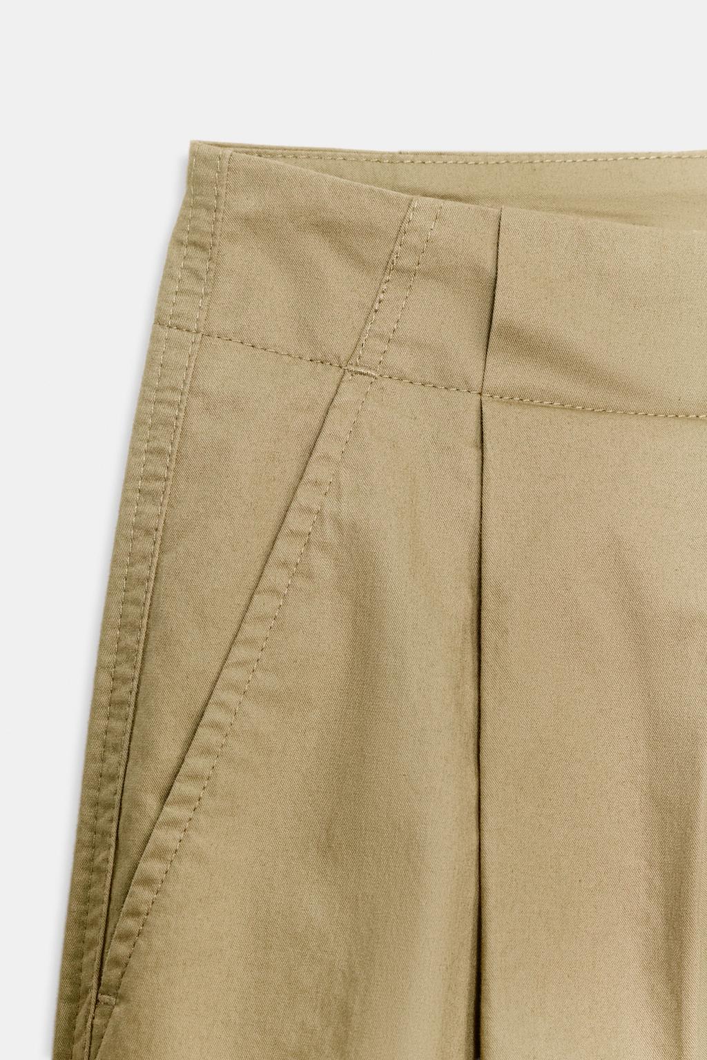 БРЮКИ  С ЗАЩИПАМИ