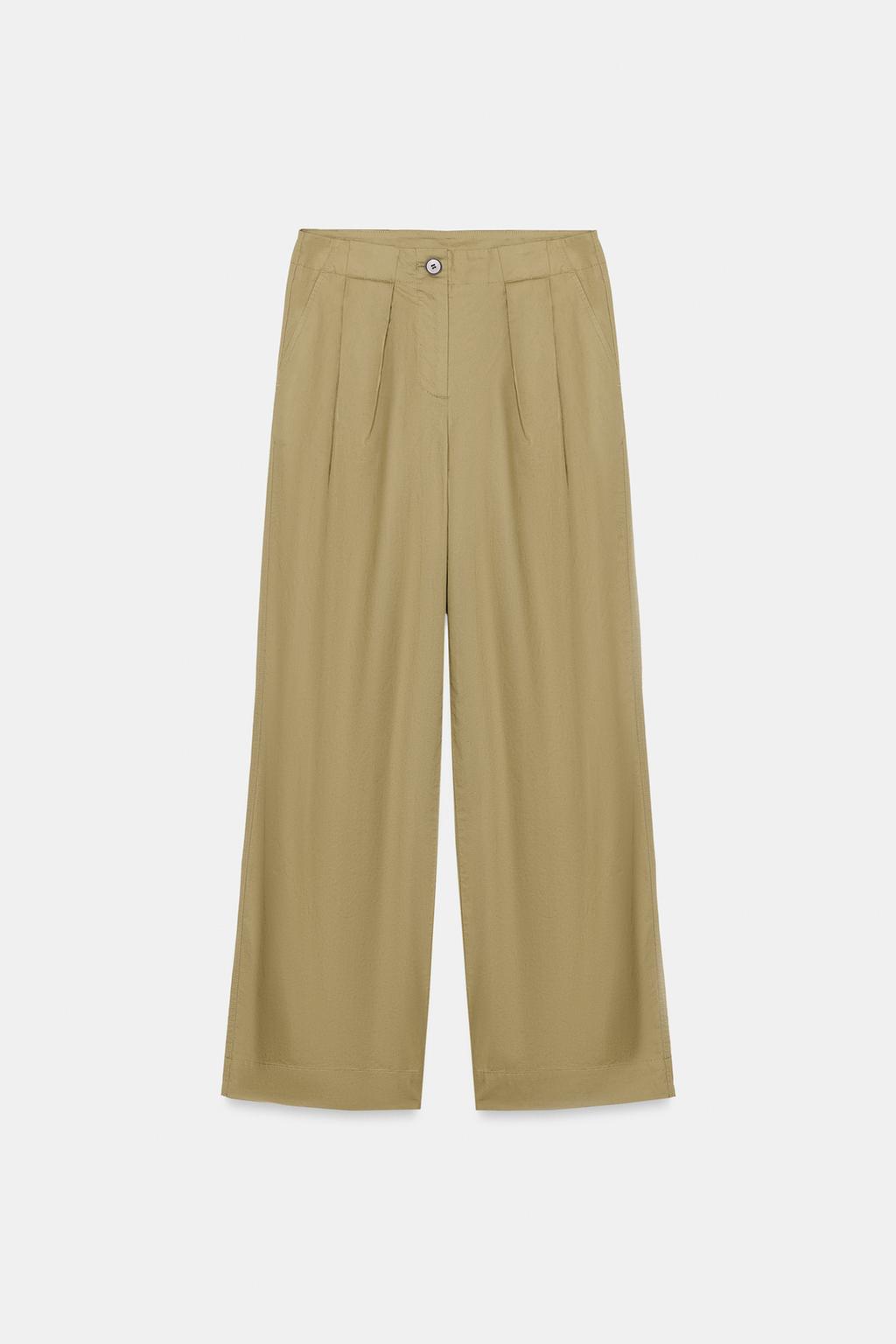 БРЮКИ  С ЗАЩИПАМИ