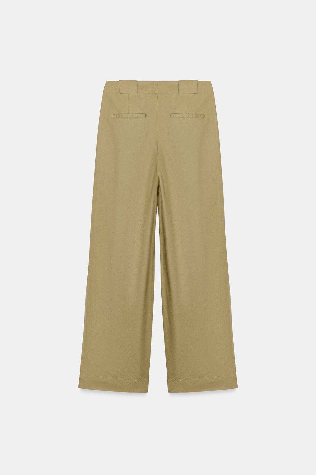 БРЮКИ  С ЗАЩИПАМИ