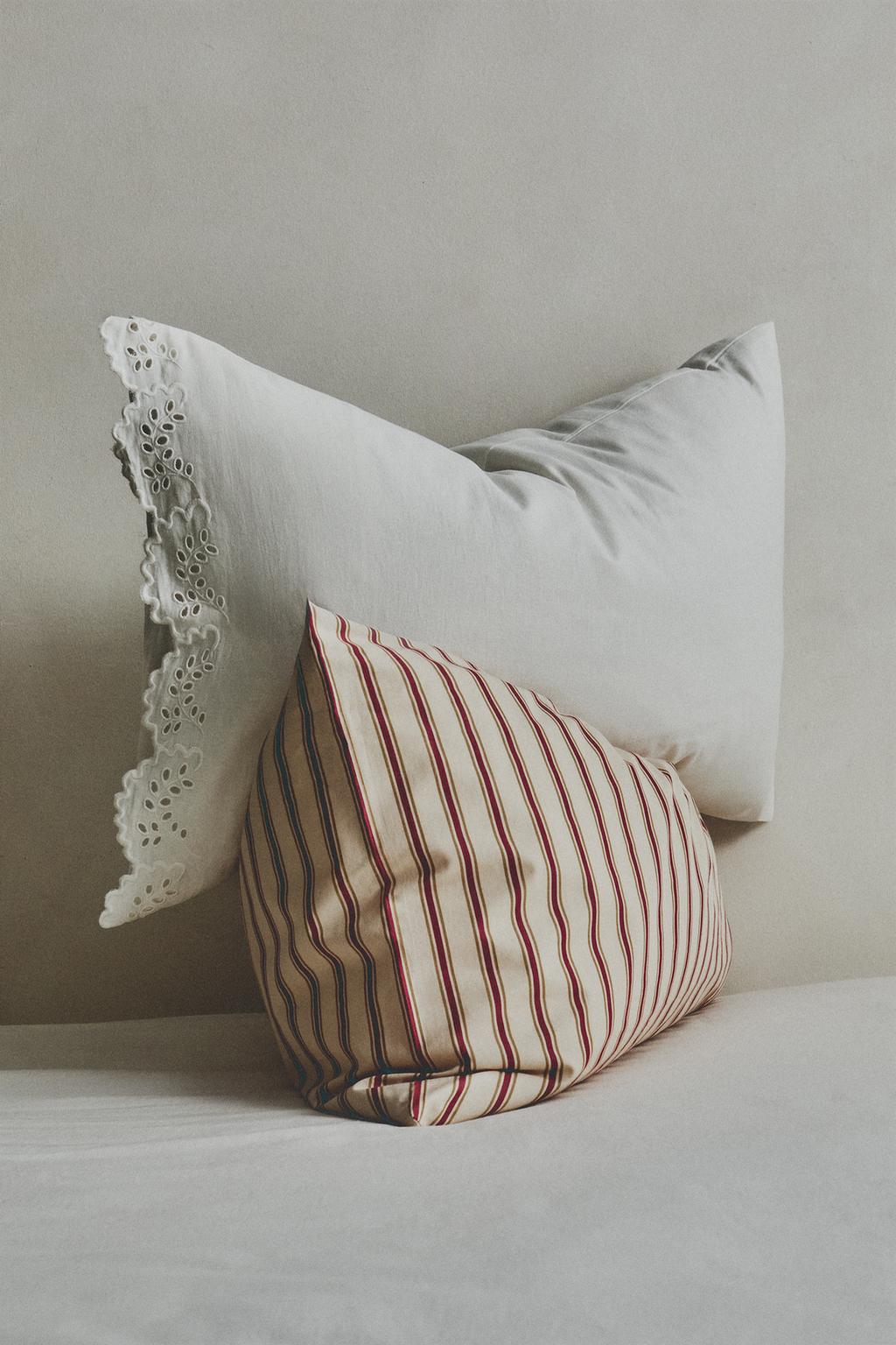 Подушка с вышивкой и отделкой