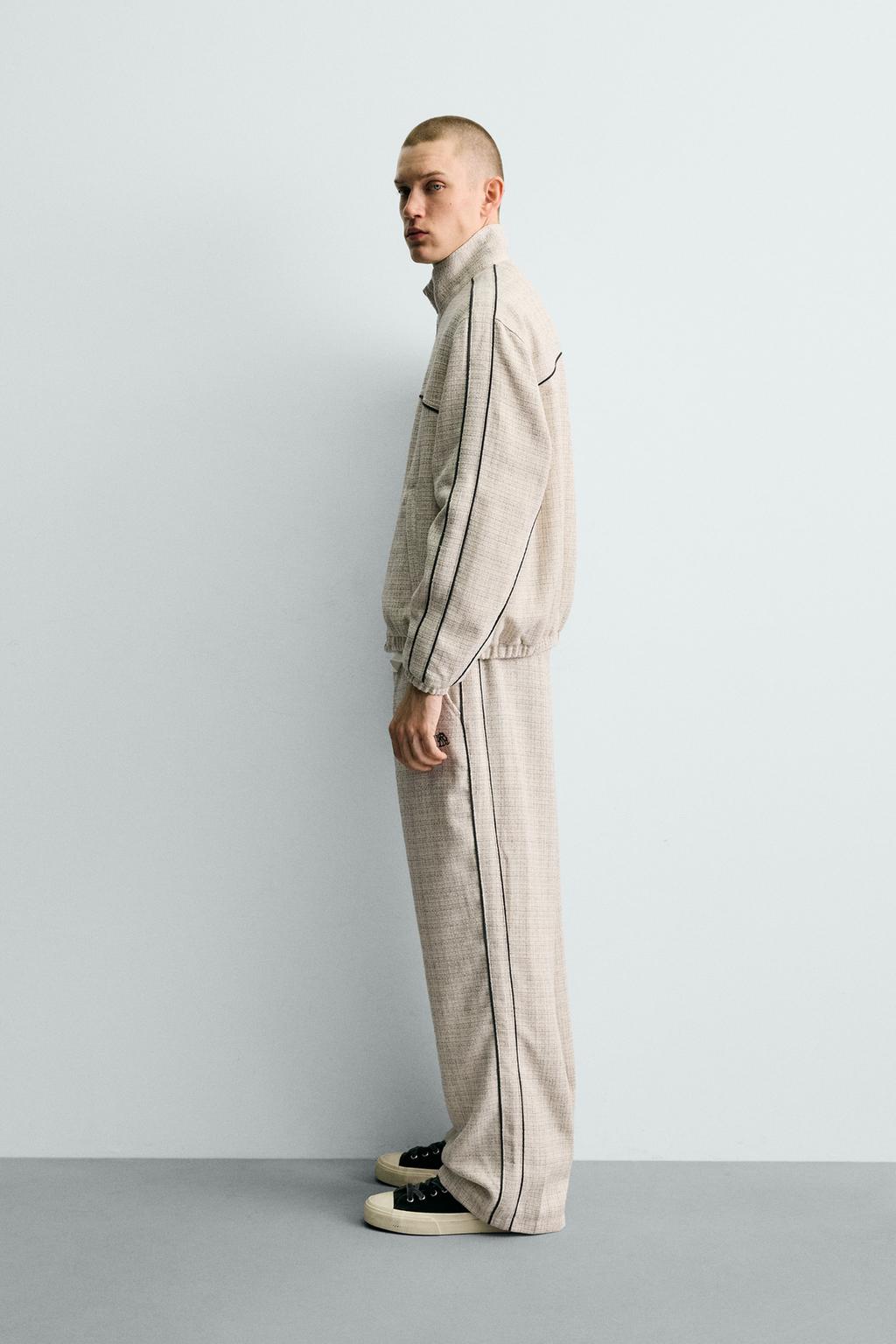 БРЮКИ-ДЖОГГЕРЫ С КОНТРАСТНЫМИ ЛАМПАСАМИ