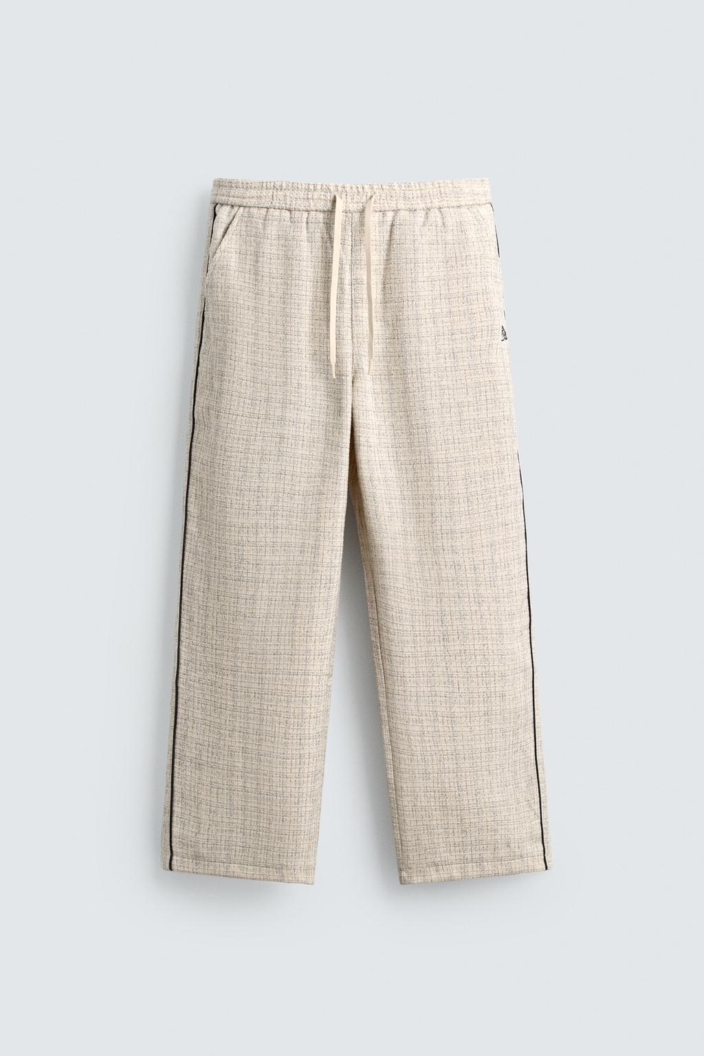 БРЮКИ-ДЖОГГЕРЫ С КОНТРАСТНЫМИ ЛАМПАСАМИ