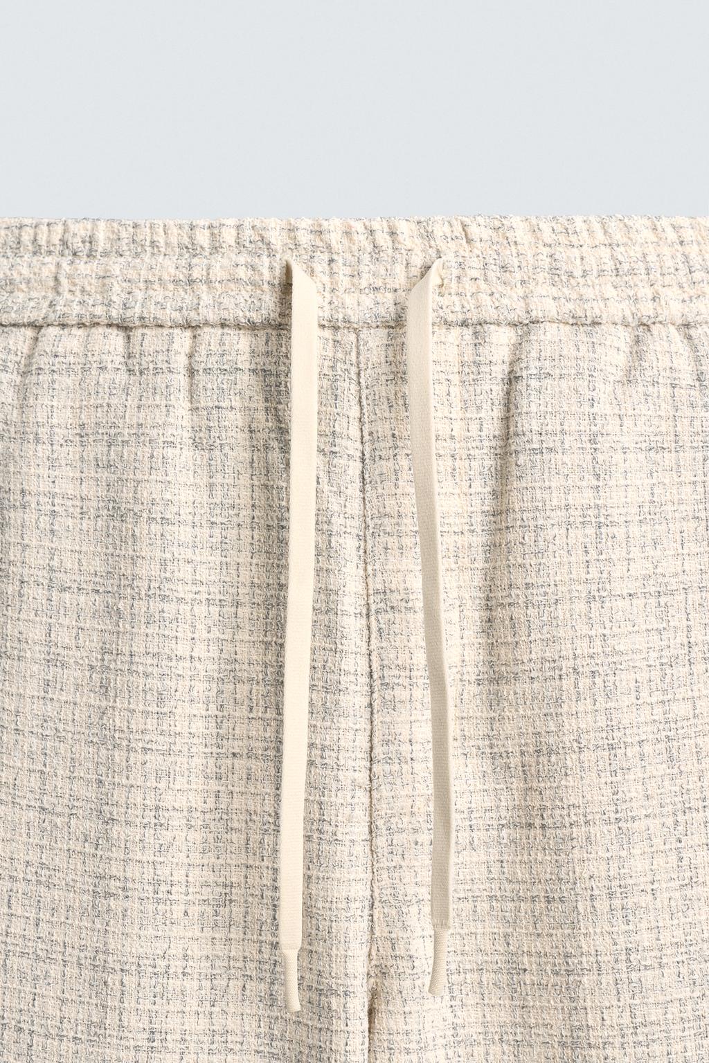 БРЮКИ-ДЖОГГЕРЫ С КОНТРАСТНЫМИ ЛАМПАСАМИ