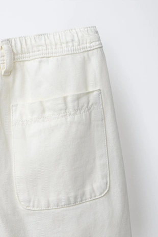 Брюки с пуговицами- Заказать в России