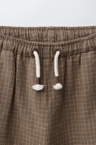 Брюки в клетку из хлопка и льна- Заказать в России