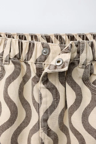 Джинсы с геометрическим принтом- Заказать в России