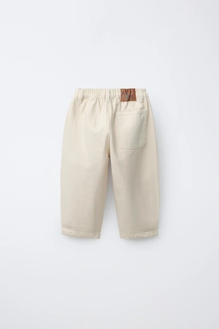 Брюки Багги с текстовым принтом- Заказать в России