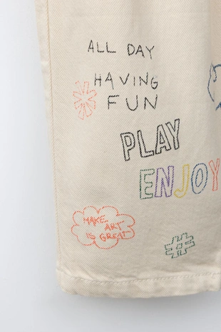 Брюки Багги с текстовым принтом- Заказать в России