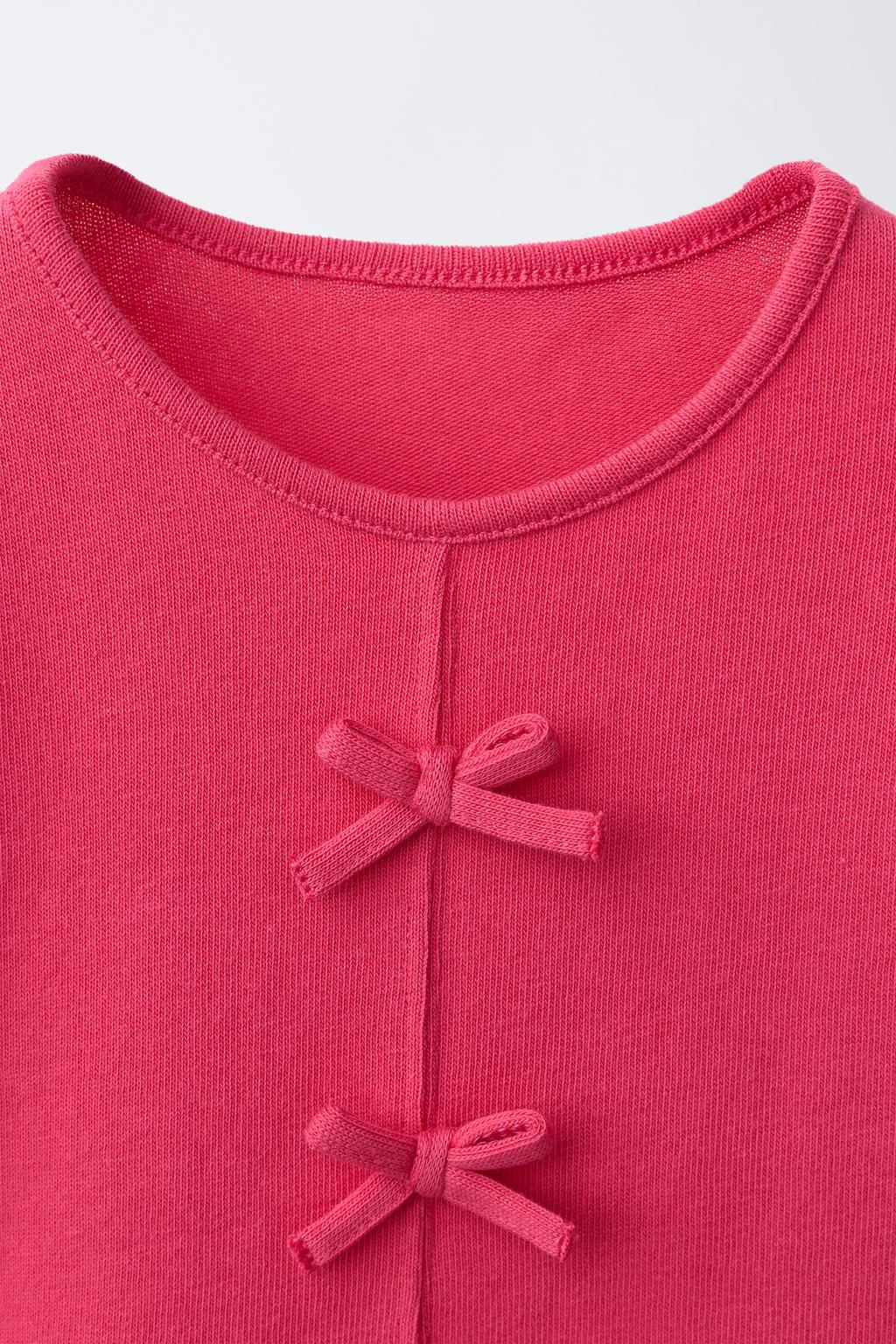 ФУТБОЛКА С БАНТАМИ И ВОЛАНАМИ