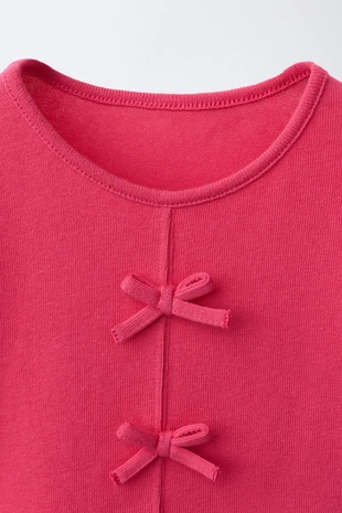 Футболка с бантами и воланами- Заказать в России