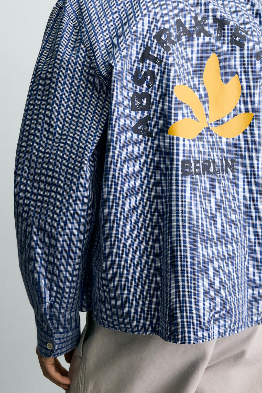 УКОРОЧЕННАЯ РУБАШКА В КЛЕТКУ С ВЫШИВКОЙ