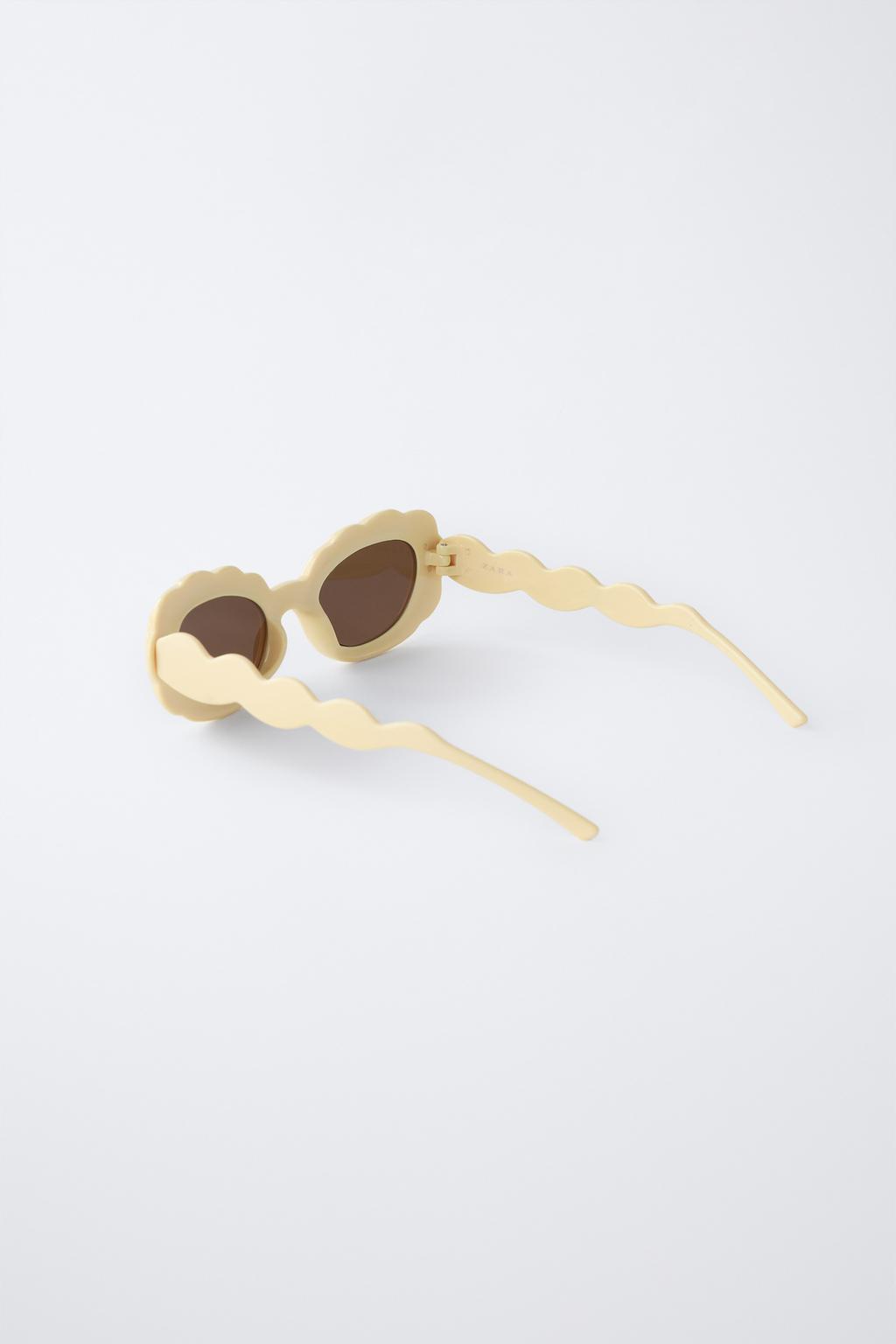 СОЛНЦЕЗАЩИТНЫЕ ОЧКИ С ВОЛНИСТОЙ ОПРАВОЙ