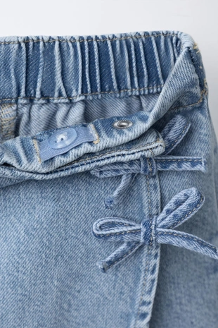 Джинсовая юбка-шорты с бантами- Заказать в России