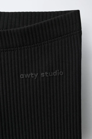 Велосипедные легинсы в рубчик с рельефной надписью- Заказать в России