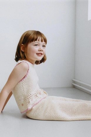 Вязаные крючком брюки-кюлоты с цветами- Заказать в России