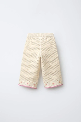 Вязаные крючком брюки-кюлоты с цветами- Заказать в России