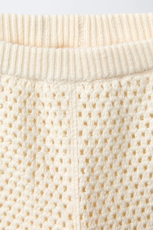 Вязаные крючком брюки-кюлоты с цветами- Заказать в России