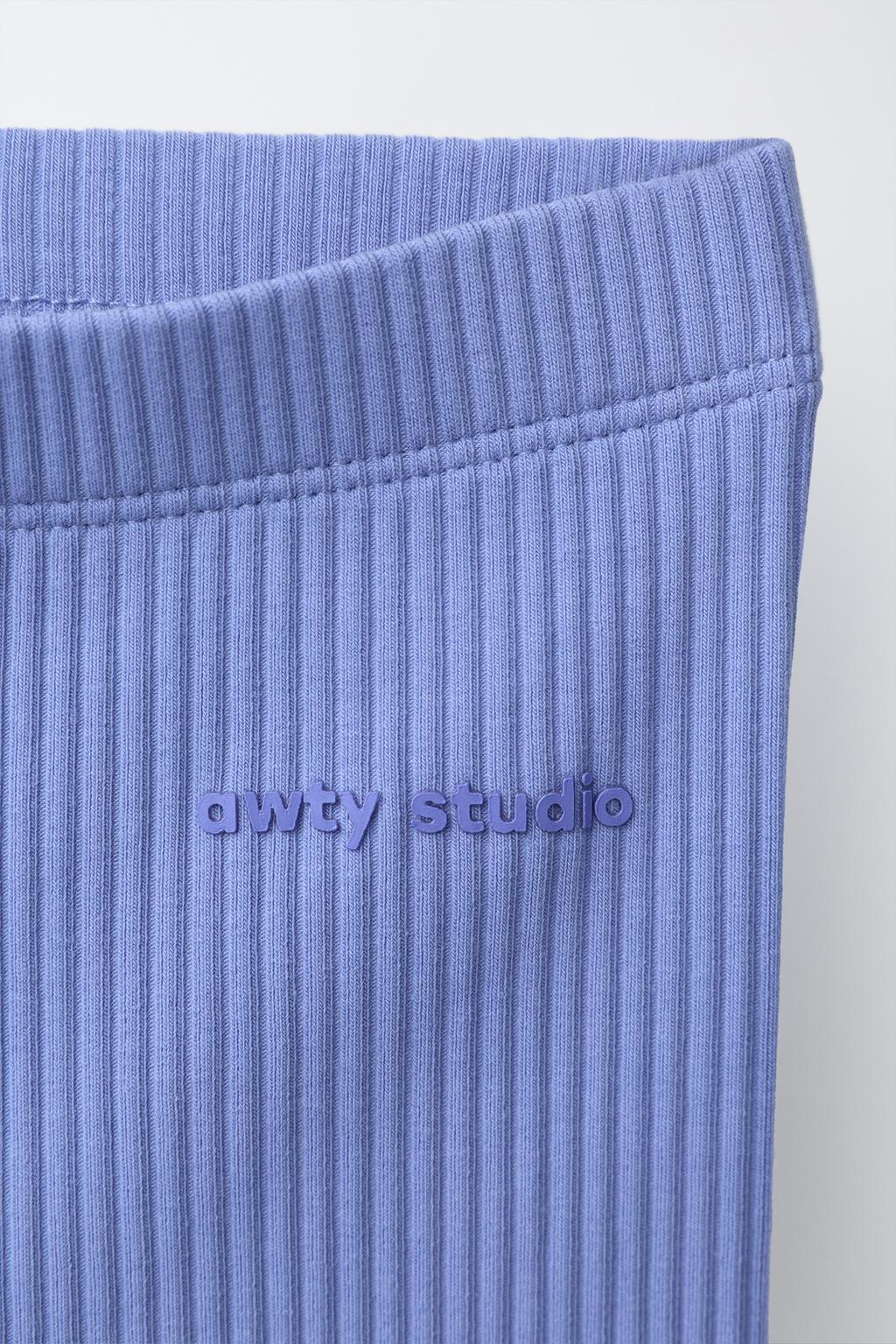 ЛЕГИНСЫ-ВЕЛОСИПЕДКИ В РУБЧИК С РЕЛЬЕФНОЙ НАДПИСЬЮ