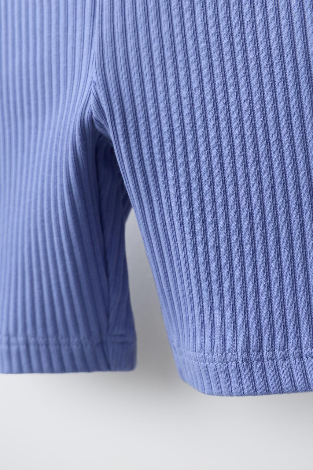 ЛЕГИНСЫ-ВЕЛОСИПЕДКИ В РУБЧИК С РЕЛЬЕФНОЙ НАДПИСЬЮ