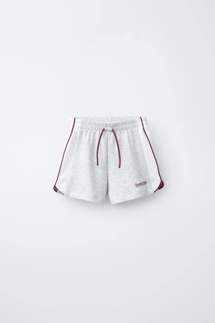 Спортивные шорты-бермуды с контрастными элементами- Заказать в России