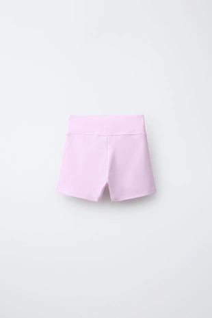 Короткие легинсы в рубчик