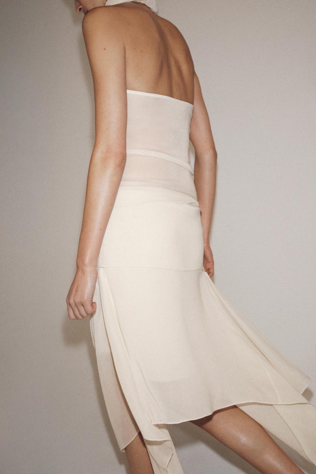 СВОБОДНЫЙ ТОП С ГОРЛОВИНОЙ ХАЛТЕР