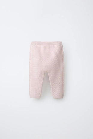 Трикотажные брюки с вышитым цветком- Заказать в России