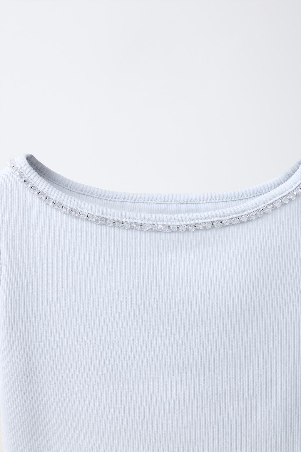 ФУТБОЛКА В РУБЧИК СО СТРАЗАМИ