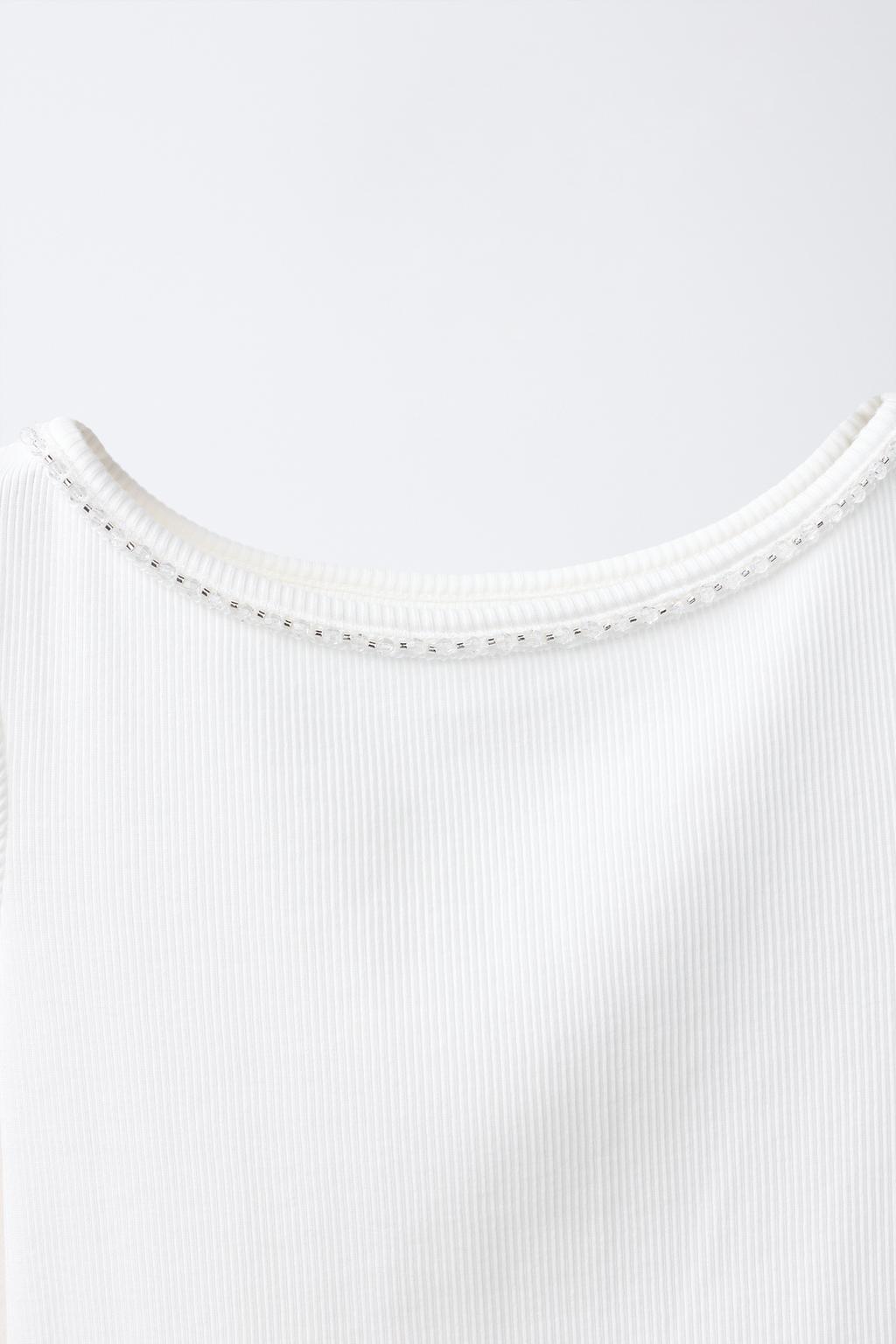 ФУТБОЛКА В РУБЧИК СО СТРАЗАМИ