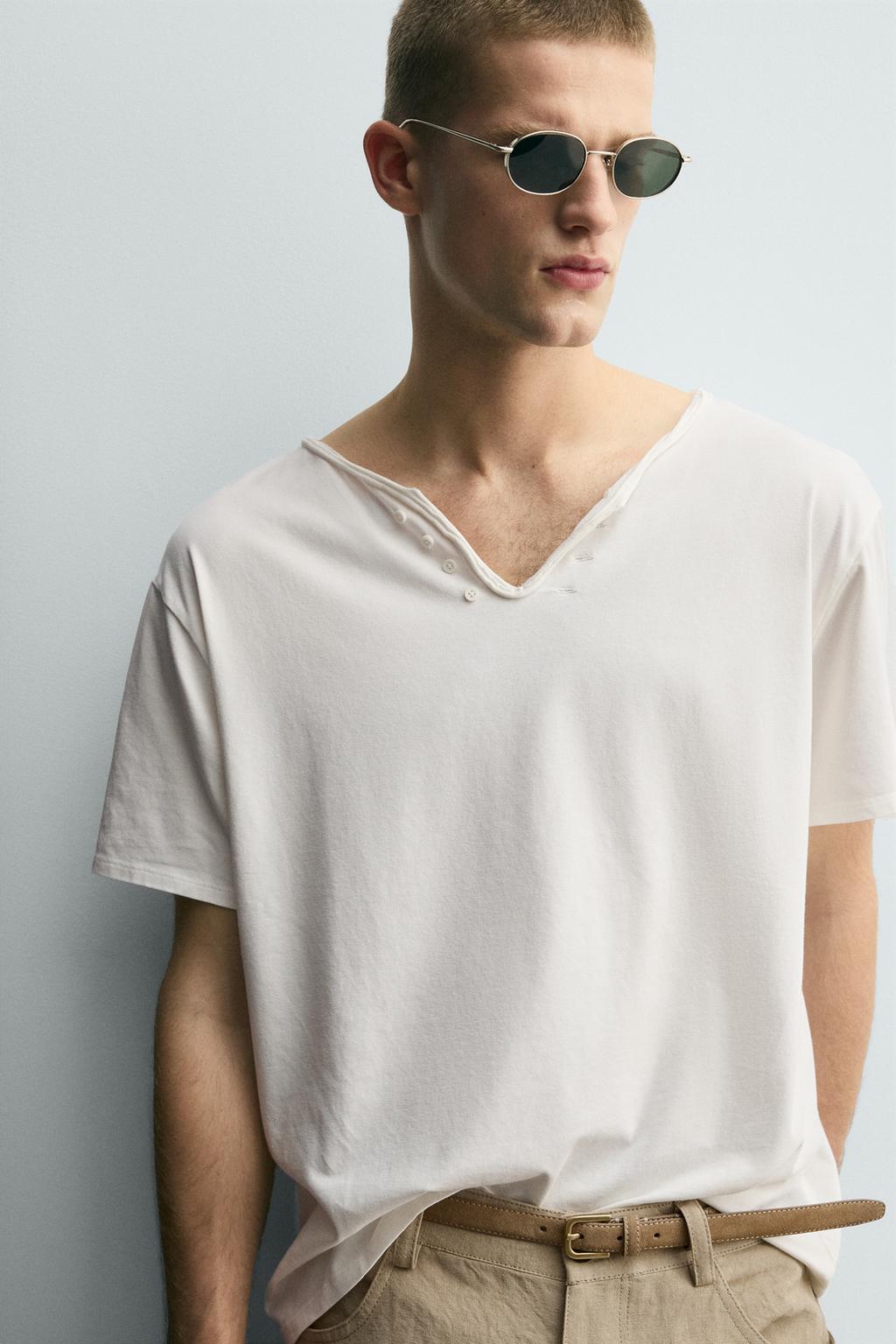 ФУТБОЛКА С ШИРОКИМ НЕПРАВИЛЬНЫМ ВОРОТНИКОМ