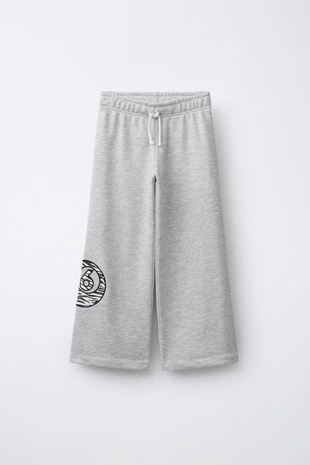 Брюки  из мягкой ткани с принтом шара для бильярда- Заказать в России